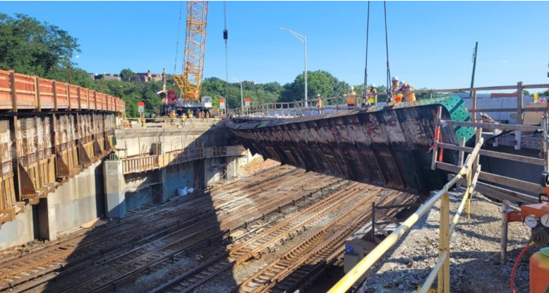 Buckling failure of the outer compound girder of an old bridge during maintenance works.