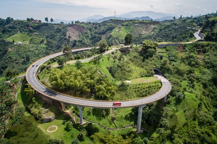 The portal of a curved tunnel leading to the helical bridge